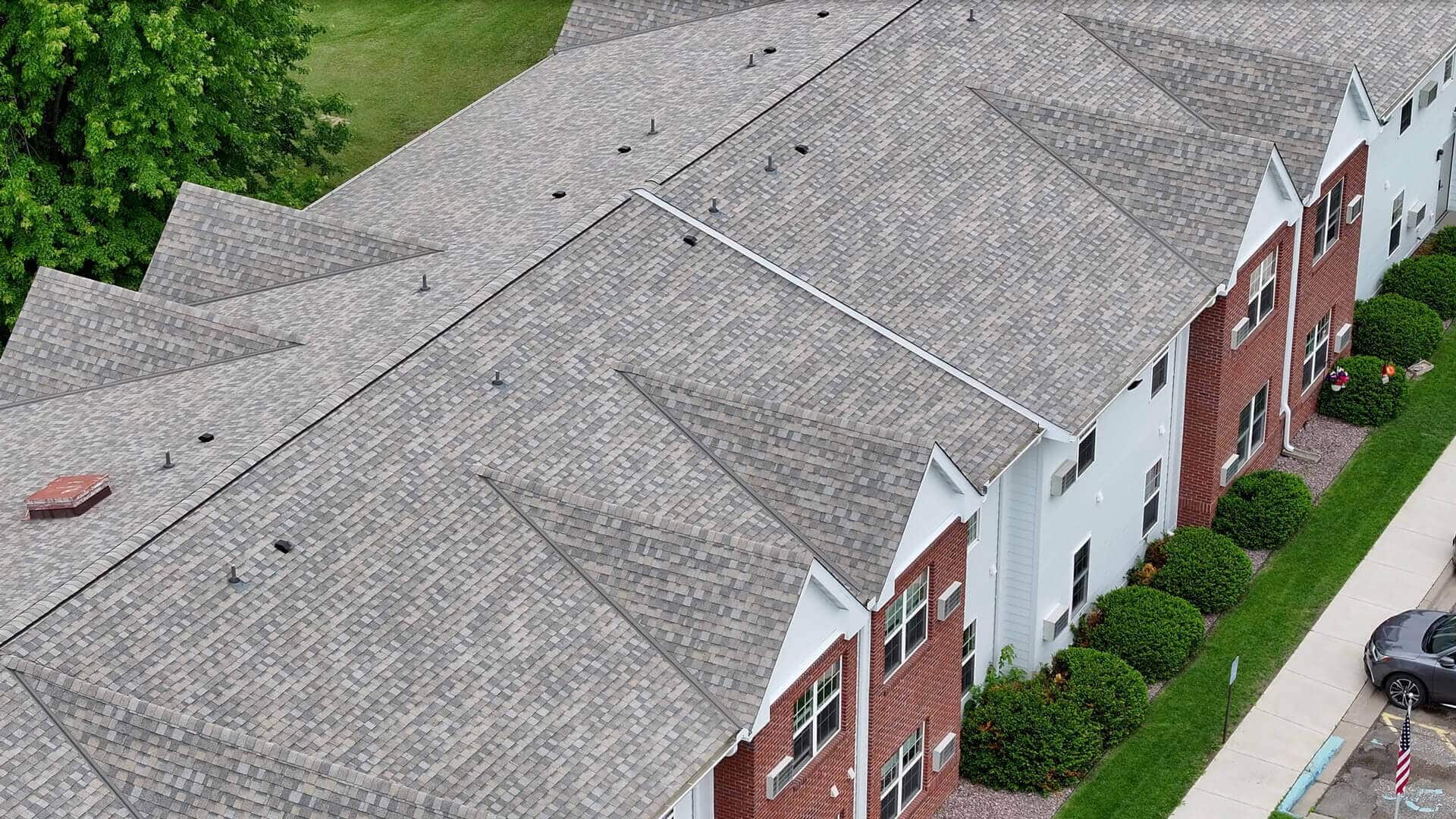 overhead view of a beautiful new roof on an apartment building